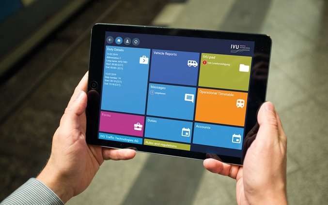 Person holding a tablet with the IVU.pad interface on the platform