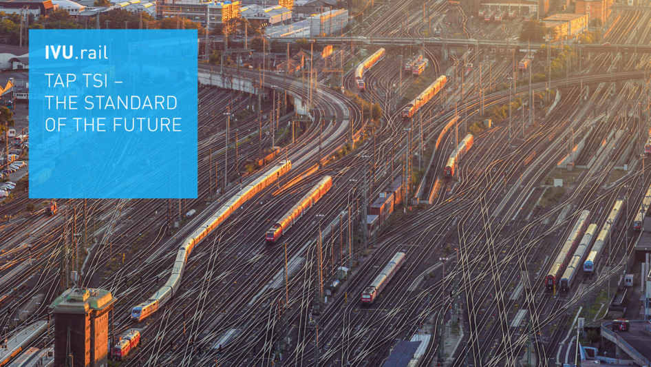 Aerial of Frankfurt am Main with numerous tracks and trains at sunrise.