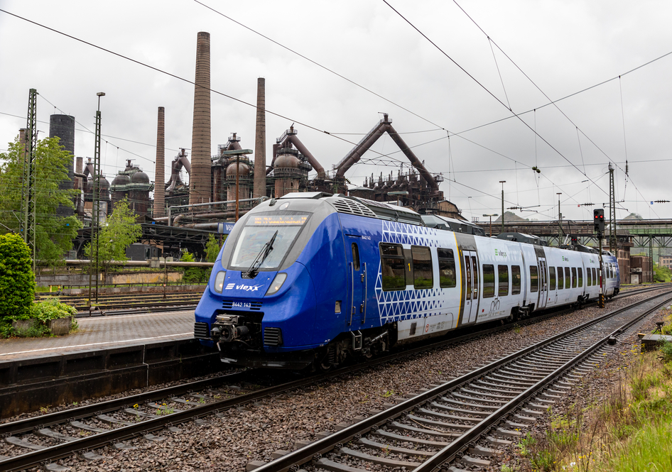 NETINERA's blue and white train stands on the platform