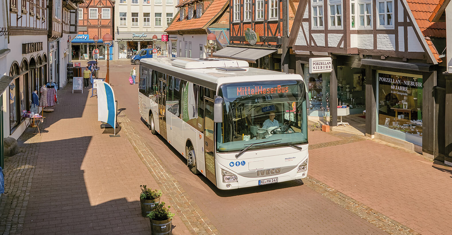 Bus drives through the street at MittelWeser