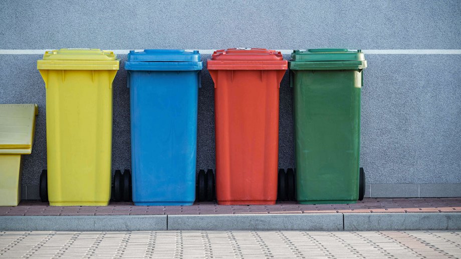 Colourful waste bins in different colours as a symbol of waste separation and recycling