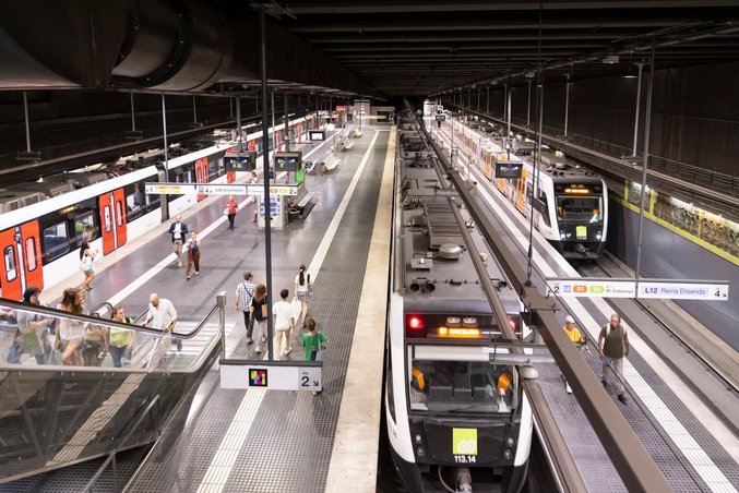 View of the underground station at Plaça de Catalunya in Barcelona with FGC trains pulling in.