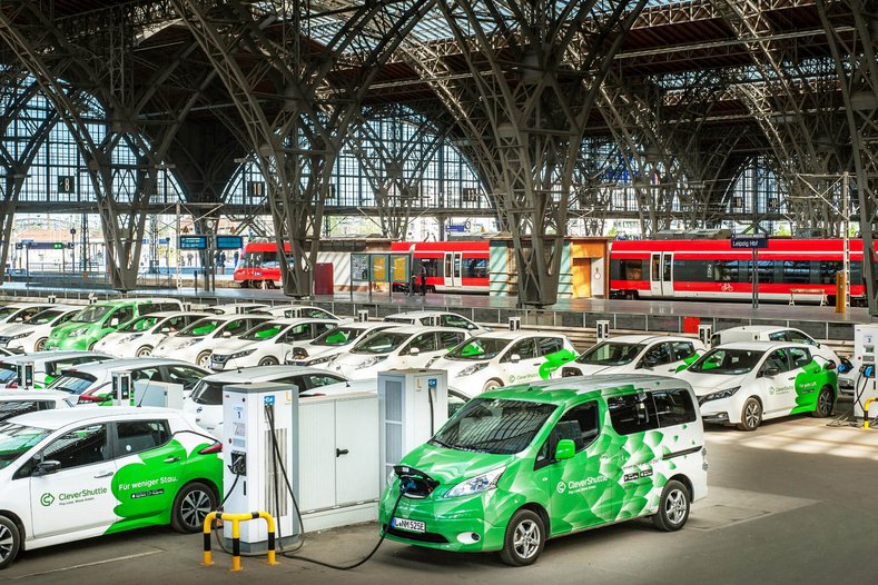 Clevershuttle cars to recharge at a power station in the station