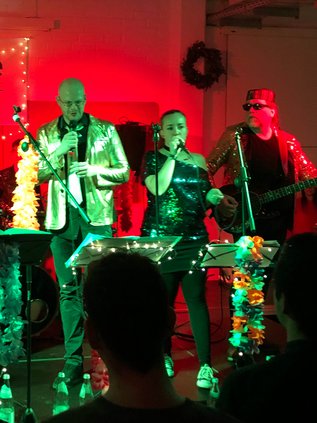The band IVU.groove on stage performing at a festival