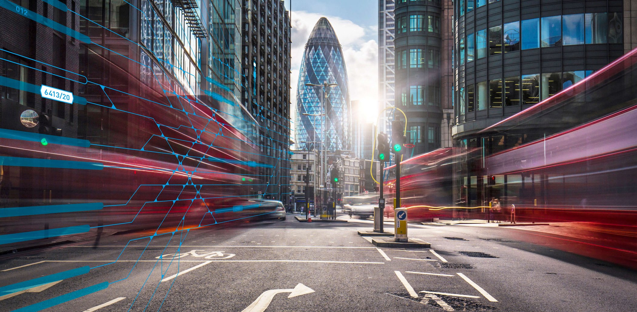 Urban scene with buses in motion blur and digital network lines overlaid