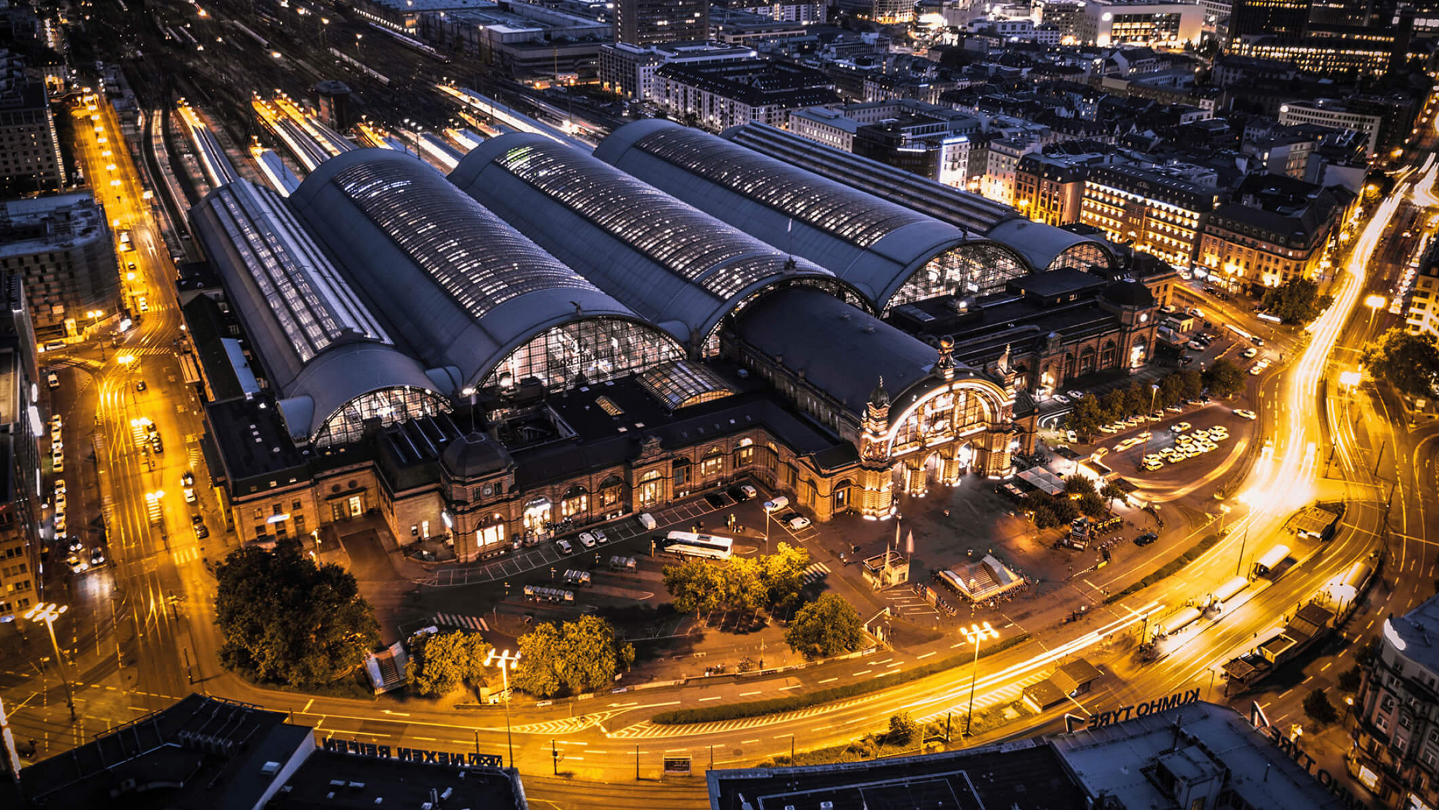 Railway station in Frankfurt at night with bright lights