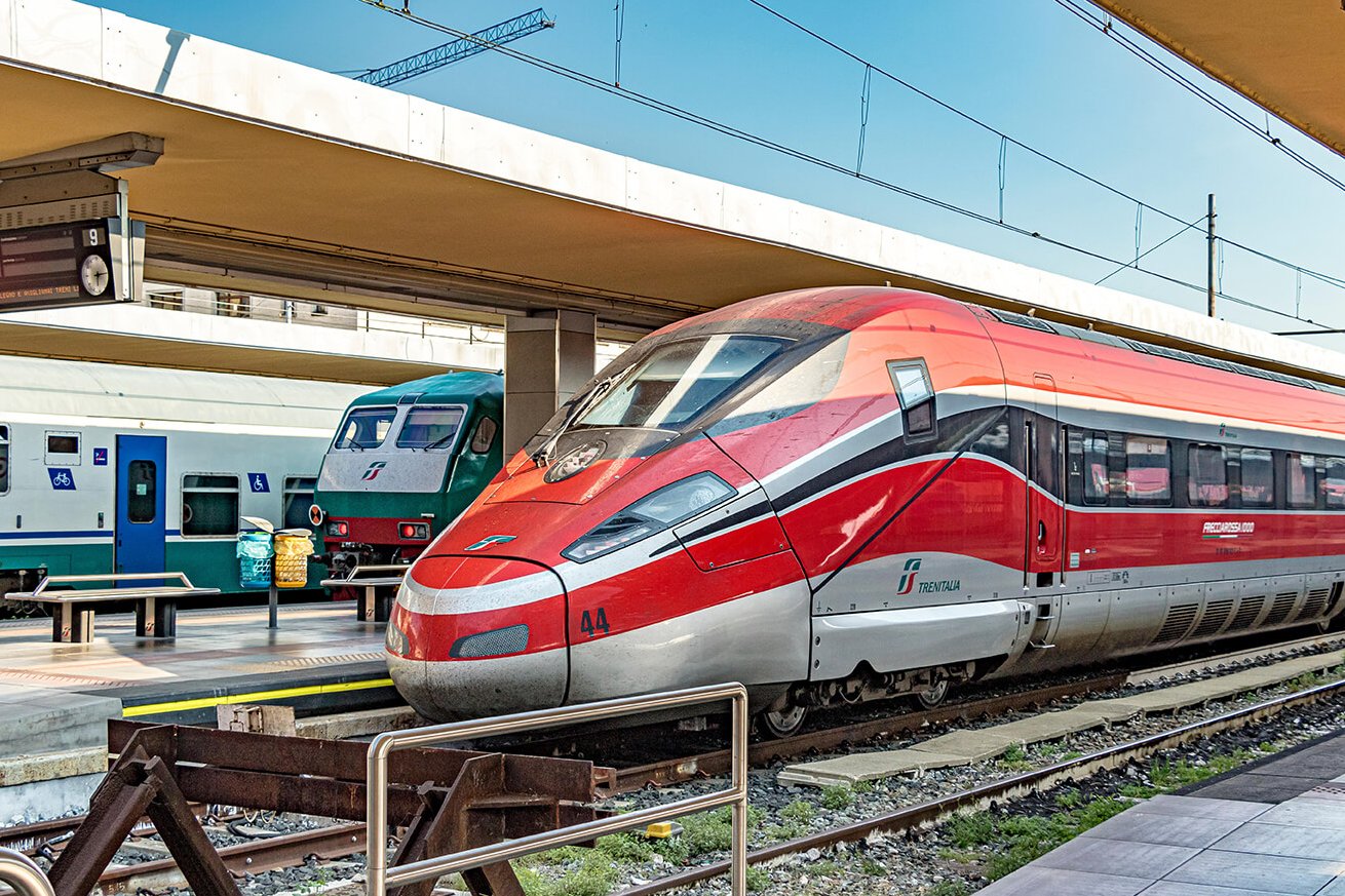 Trenitalia high-speed train standing at a railway station